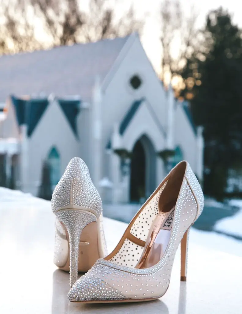 pair of glitter white pointed-toe pumps