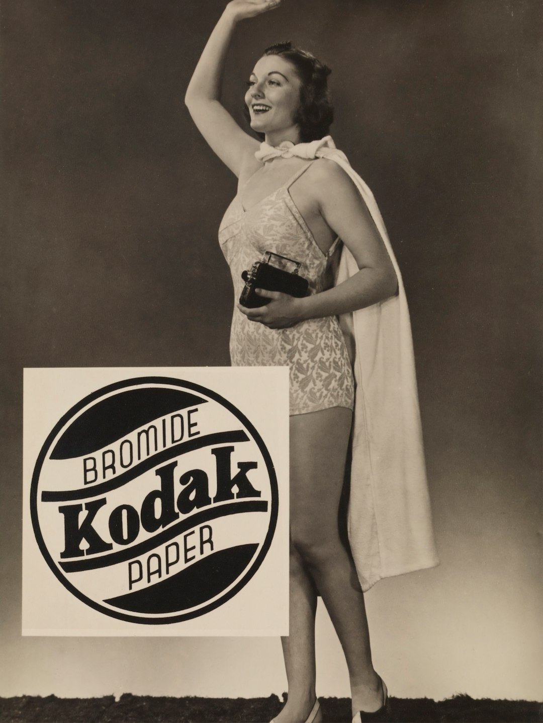 woman in white dress holding her waist