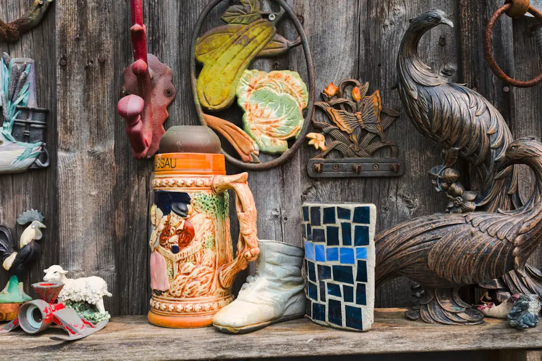 a collection of ceramic figurines and figurines on a shelf