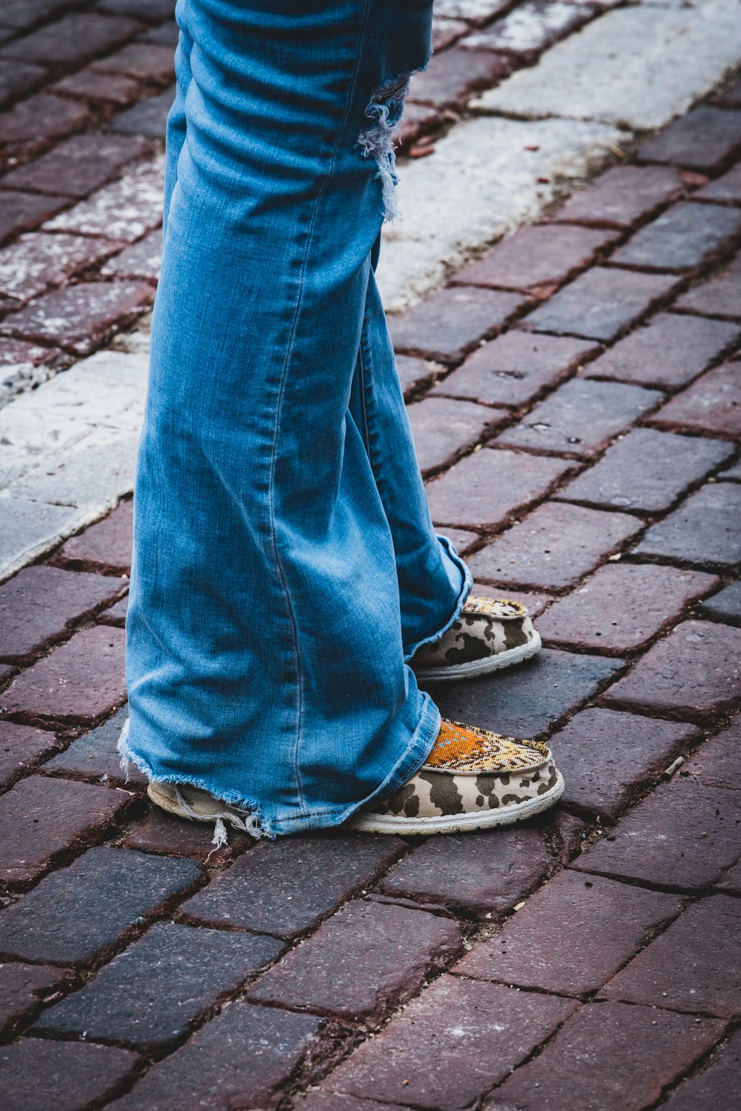 a person's legs and shoes
