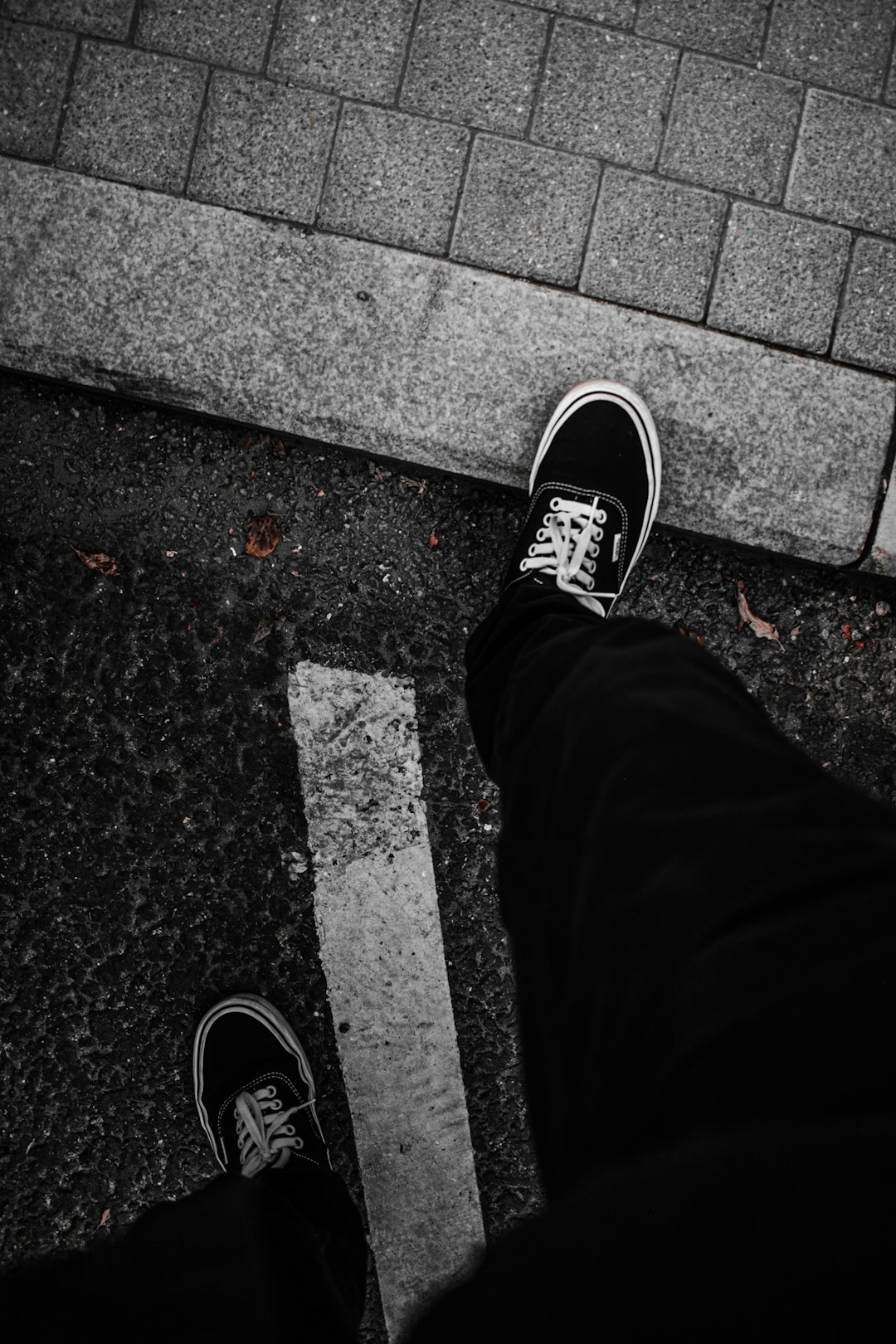 Classic vans authentic by Shoe Brands person in black pants wearing black and white sneakers