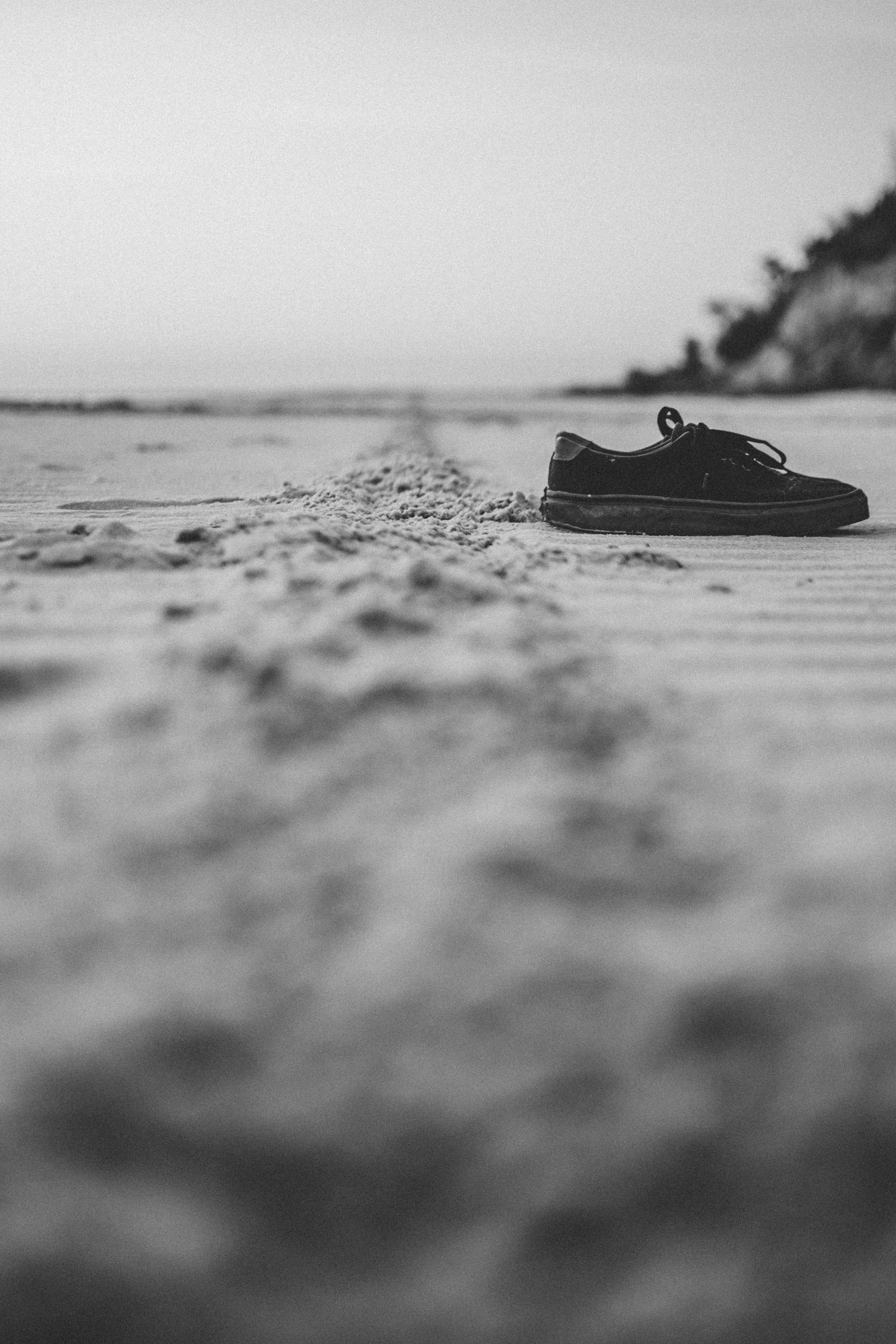black suede lace-up shoe